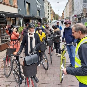 Researchers biking through Copenhagen